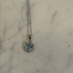 Elegant sterling Silver Necklace with gorgeous Blue Topaz round 2 ct. lab